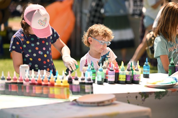 Westin Staley, 7, of San Francisco and her brother Levi,...
