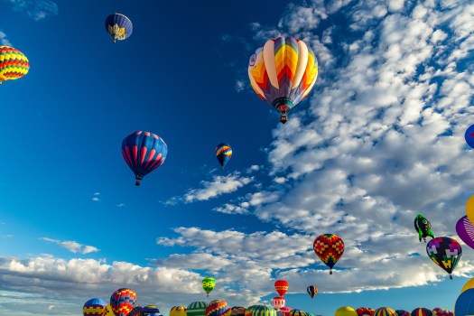 Some 600 hot air balloons soar over the city of Albuquerque, New Mexico, each fall during the annual Albuquerque International Balloon Fiesta. (Getty Images)