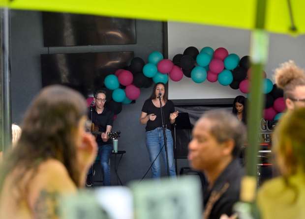 Restoration Road performs at Bootleggers during Day of Music in...