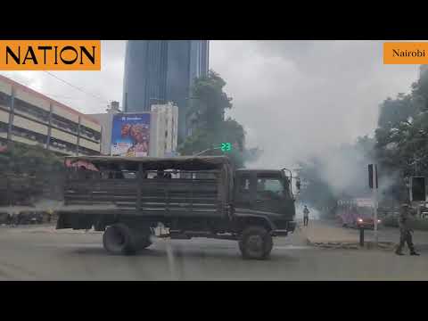 Anti-riot police disperse protesters with tear gas and water cannons in Nairobi