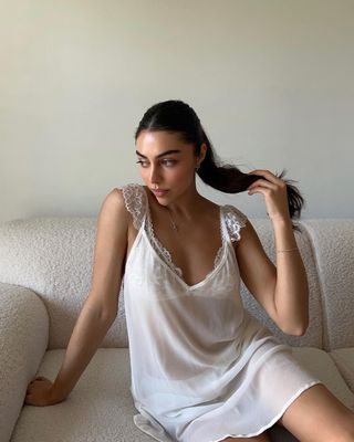 Mobina Peiman with a sleek ponytail.