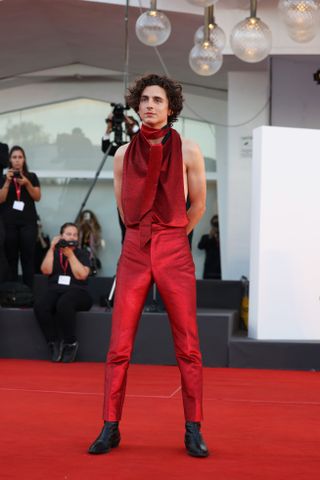 Timothee Chalamet wears a backless shirt at the Venice Film Festival