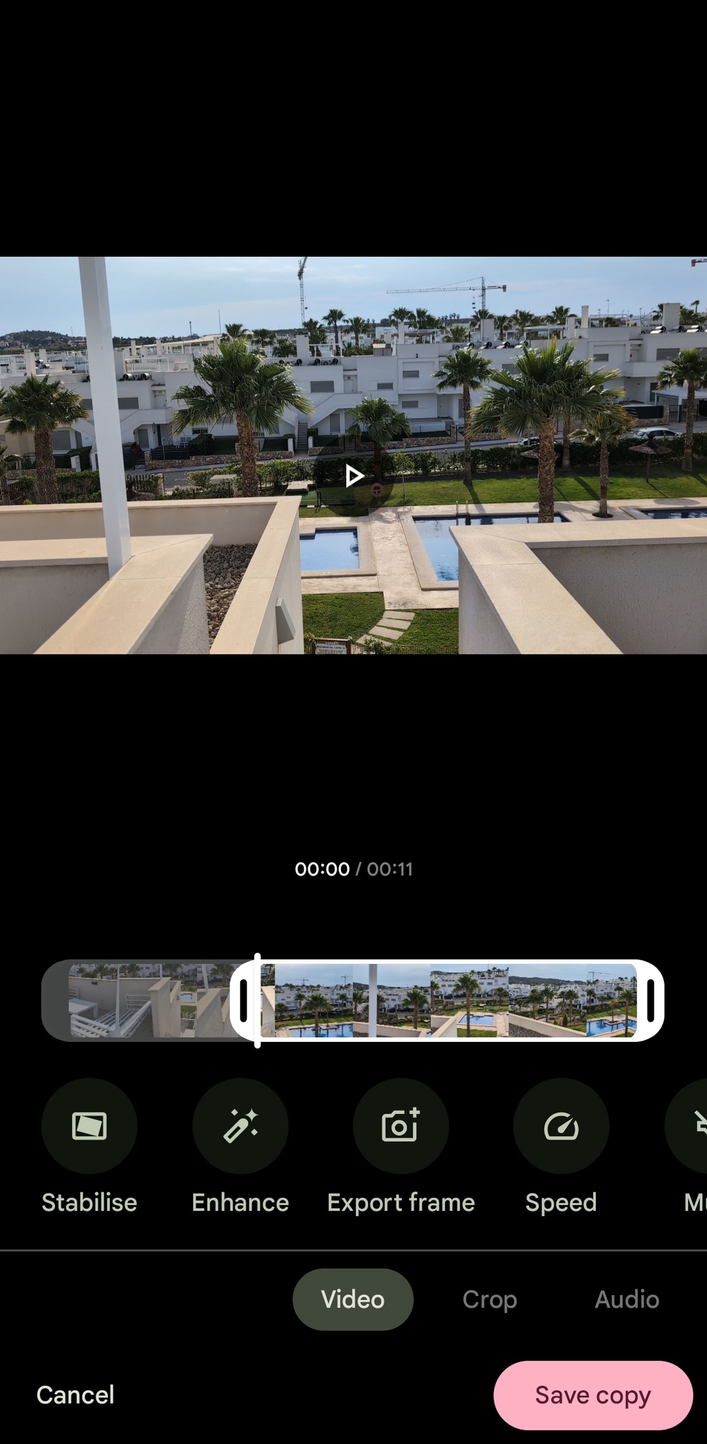 Google Photos screen with photo on top and trim tool on bottom.