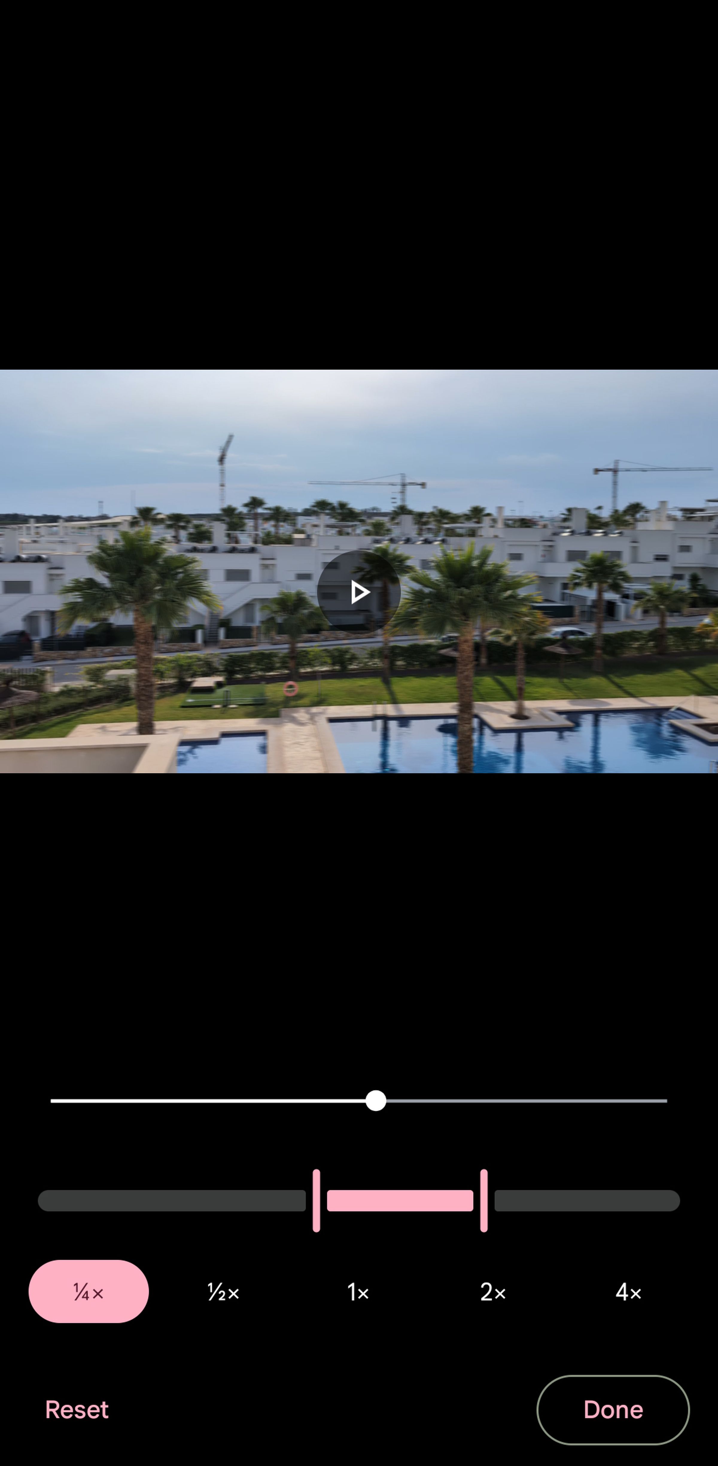 Mobile screen with photo on top and different speeds on bottom.