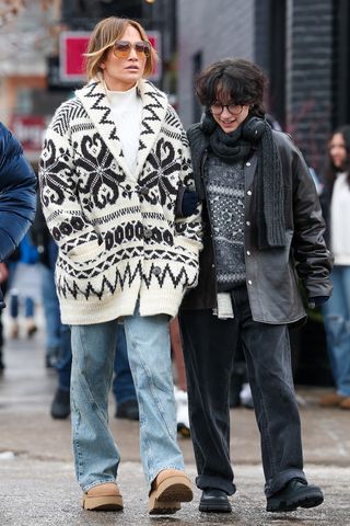 Jennifer Lopez wearing a cardigan and jeans in Aspen