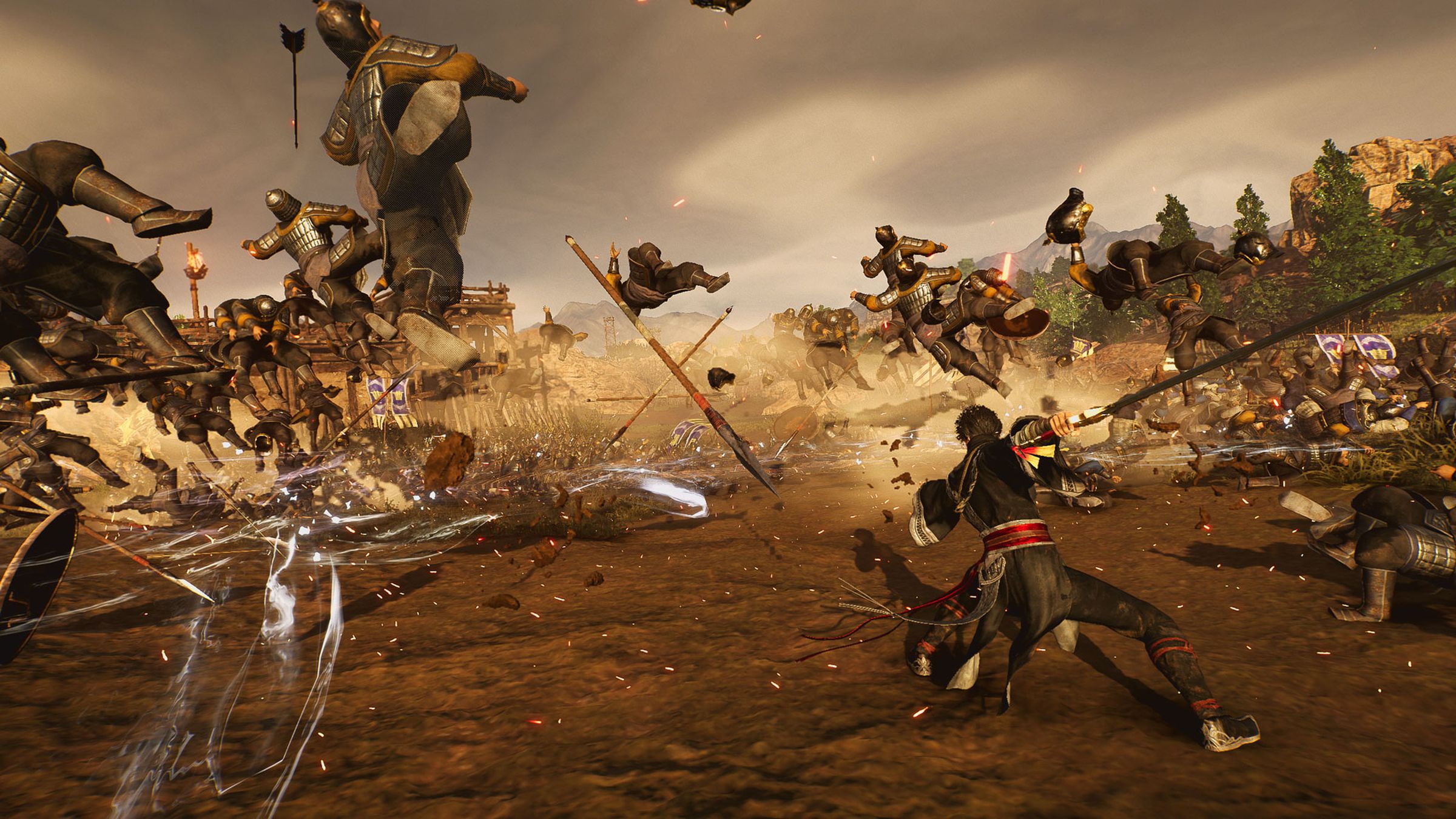 Screenshot from Dynasty Warriors: Origins featuring the Wanderer character fighting back a group of enemy soldiers.