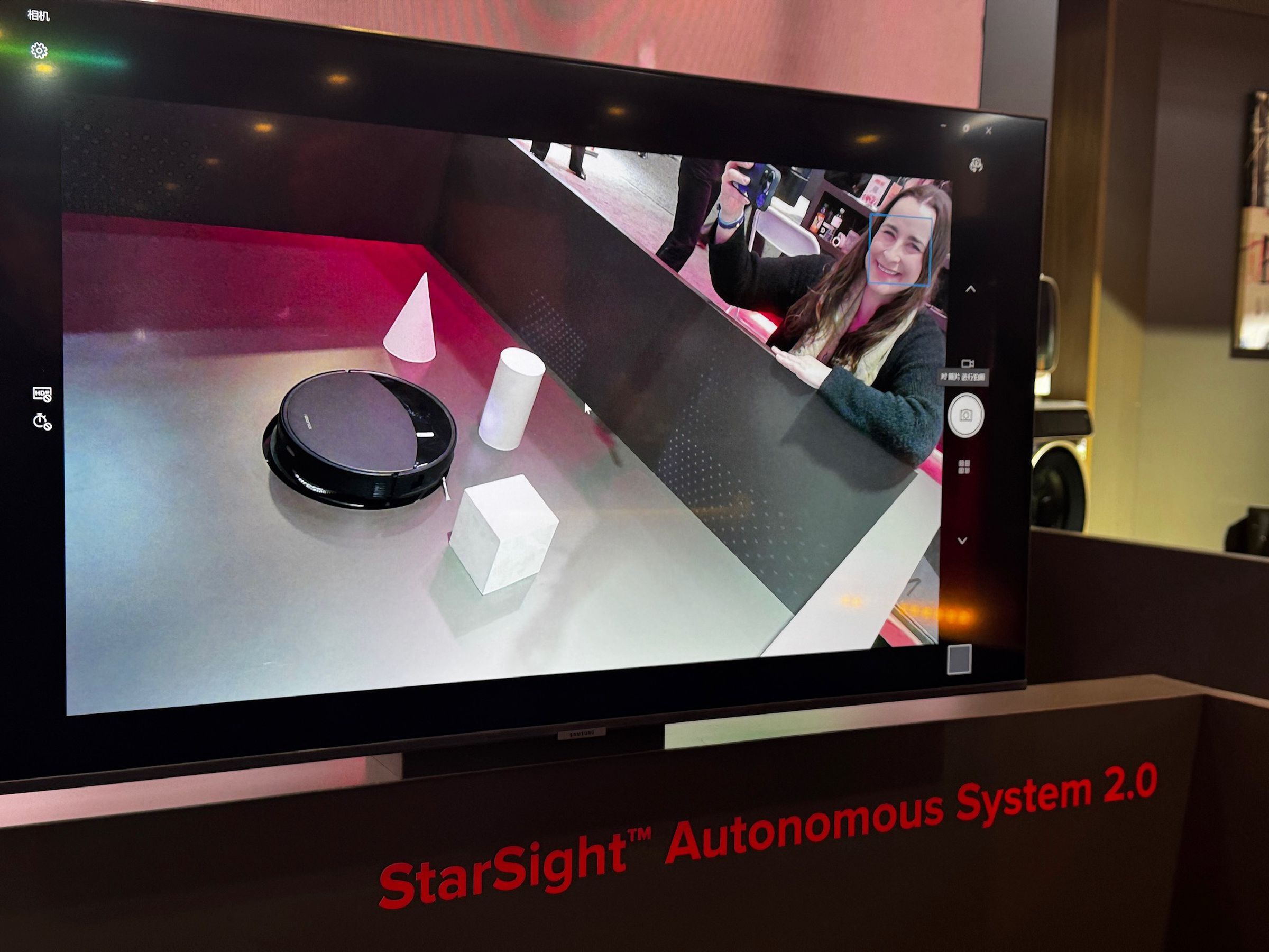 Robororock demoing its StarSight navigation system — you can make out faint radar imaging in on the dark walls visible in the video feed.
