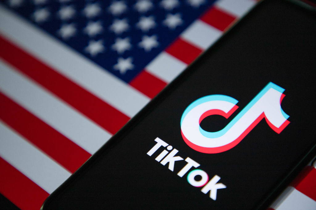 In this photo illustration, the TikTok logo is seen...
