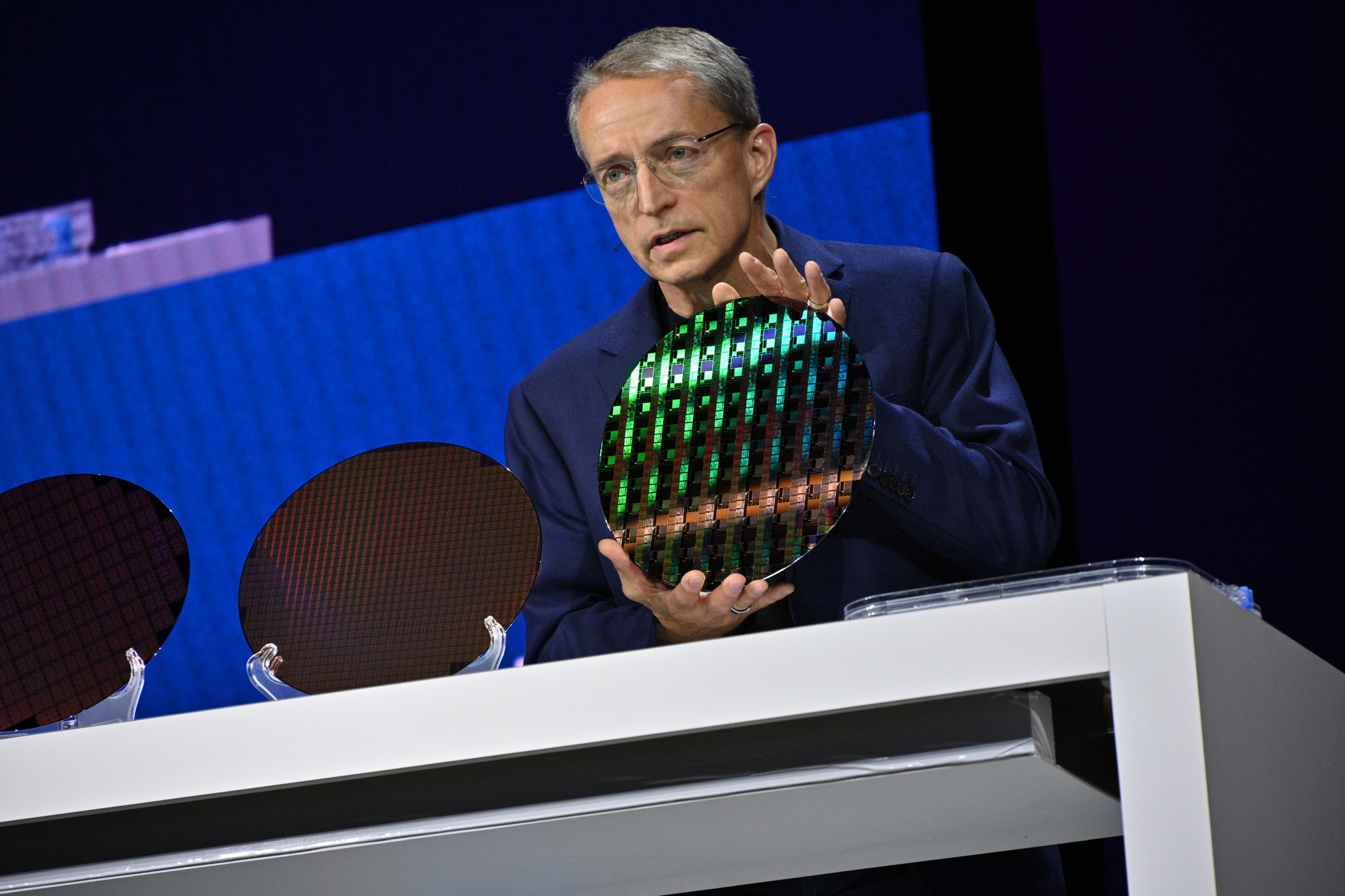 Intel CEO Pat Gelsinger holds up an early Intel 18A wafer in late 2023.