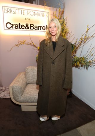 Gwyneth Paltrow wears olive green heels.