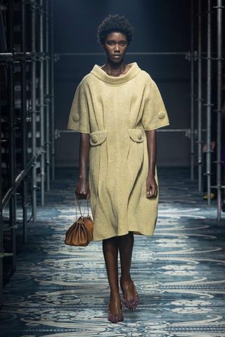 a model walks the Prada fall/winter 2025 runway during Milan Fashion Week