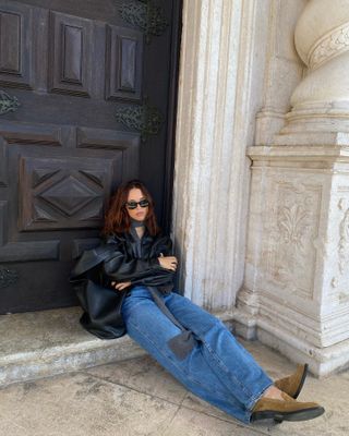 An image of influencer @deborabrosa wearing suede loafers, an alternative to ballet flats.