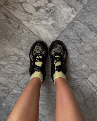 An image of @rebeccaferrazwyatt wearing Mary Jane trainers.