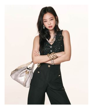 Jennie wears the Chanel 25 Handbag