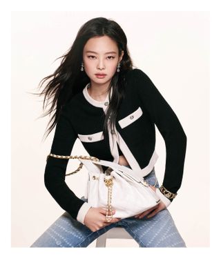 Jennie wears the Chanel 25 Handbag