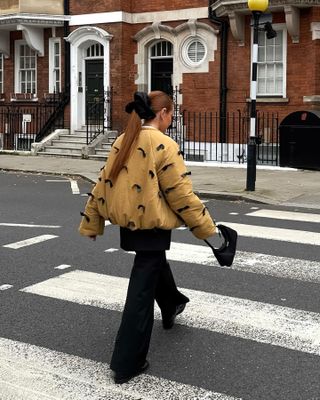 Influencer wears skirt trousers.