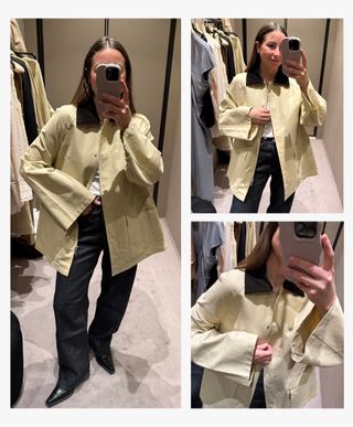 Woman takes photo in changing room mirror wearing dark jeans and beige country jacket.