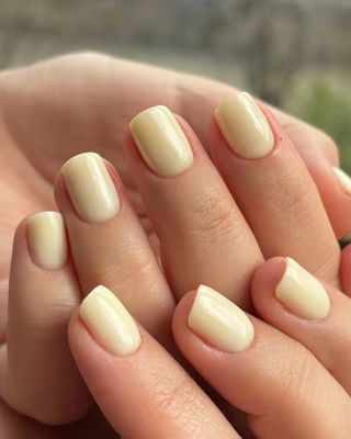 Butter yellow nails.