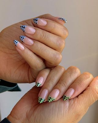Dotty french nails.