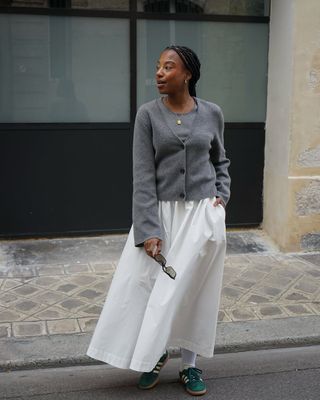 @taffymsipa wearing a voluminous skirt and cardigan