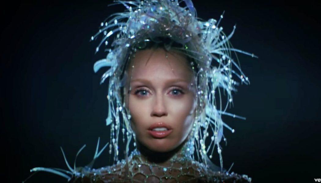 Miley Cyrus reveals explosive new song "Something Beautiful"