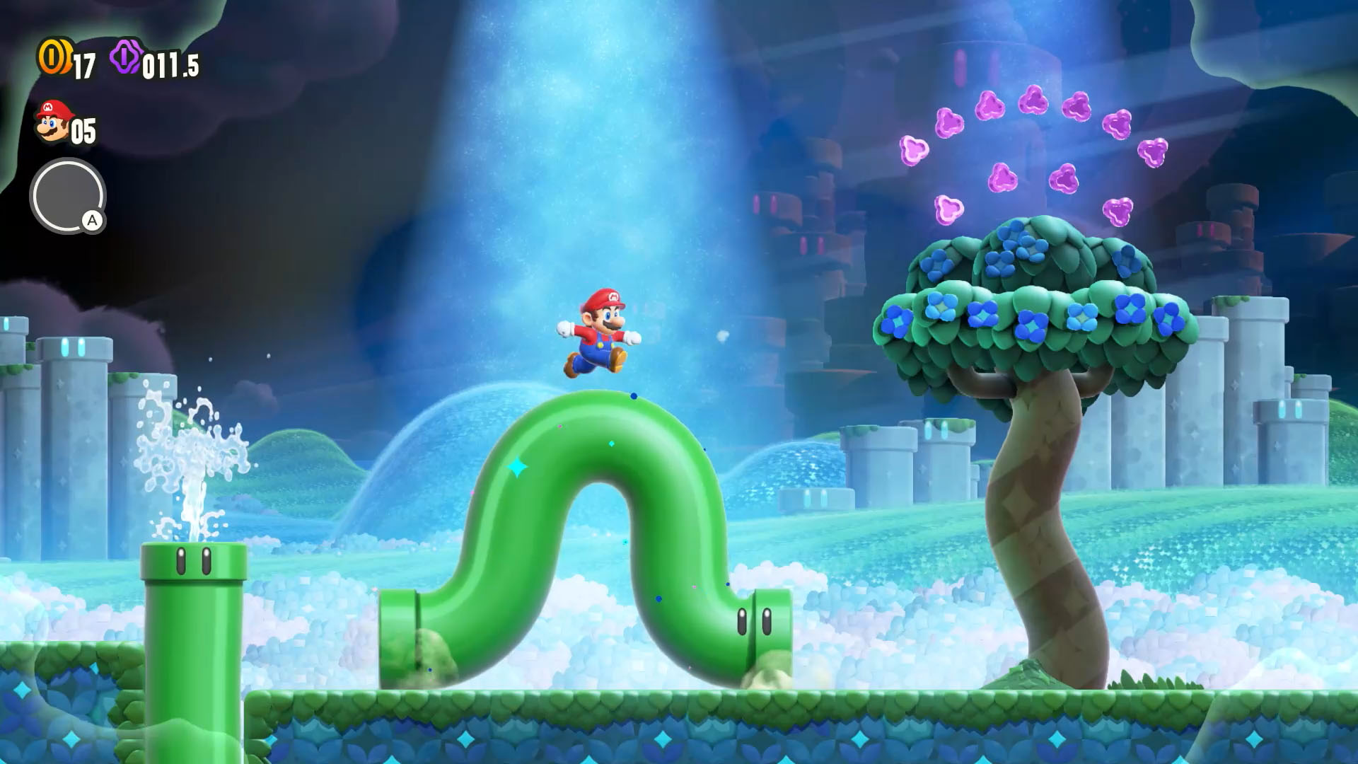 A screenshot from the video game Super Mario Bros. Wonder in which Mario stands on a wiggling green pipe in a surreal fantasy world.