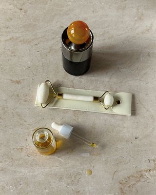 Skincare products sitting on the counter.