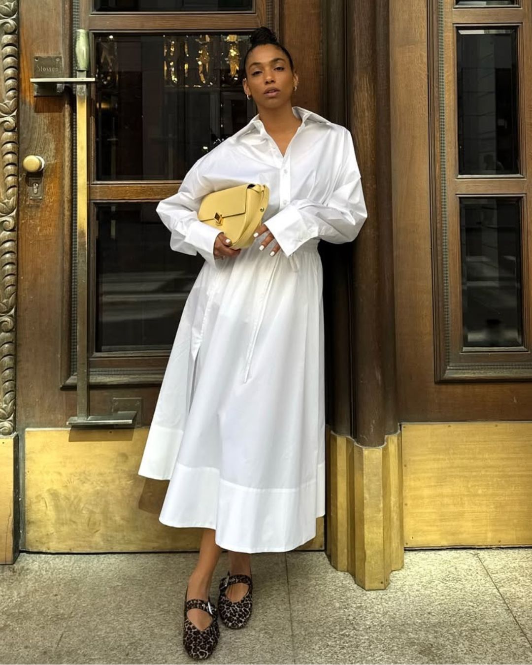 @cherifaakili wears a white poplin skirt