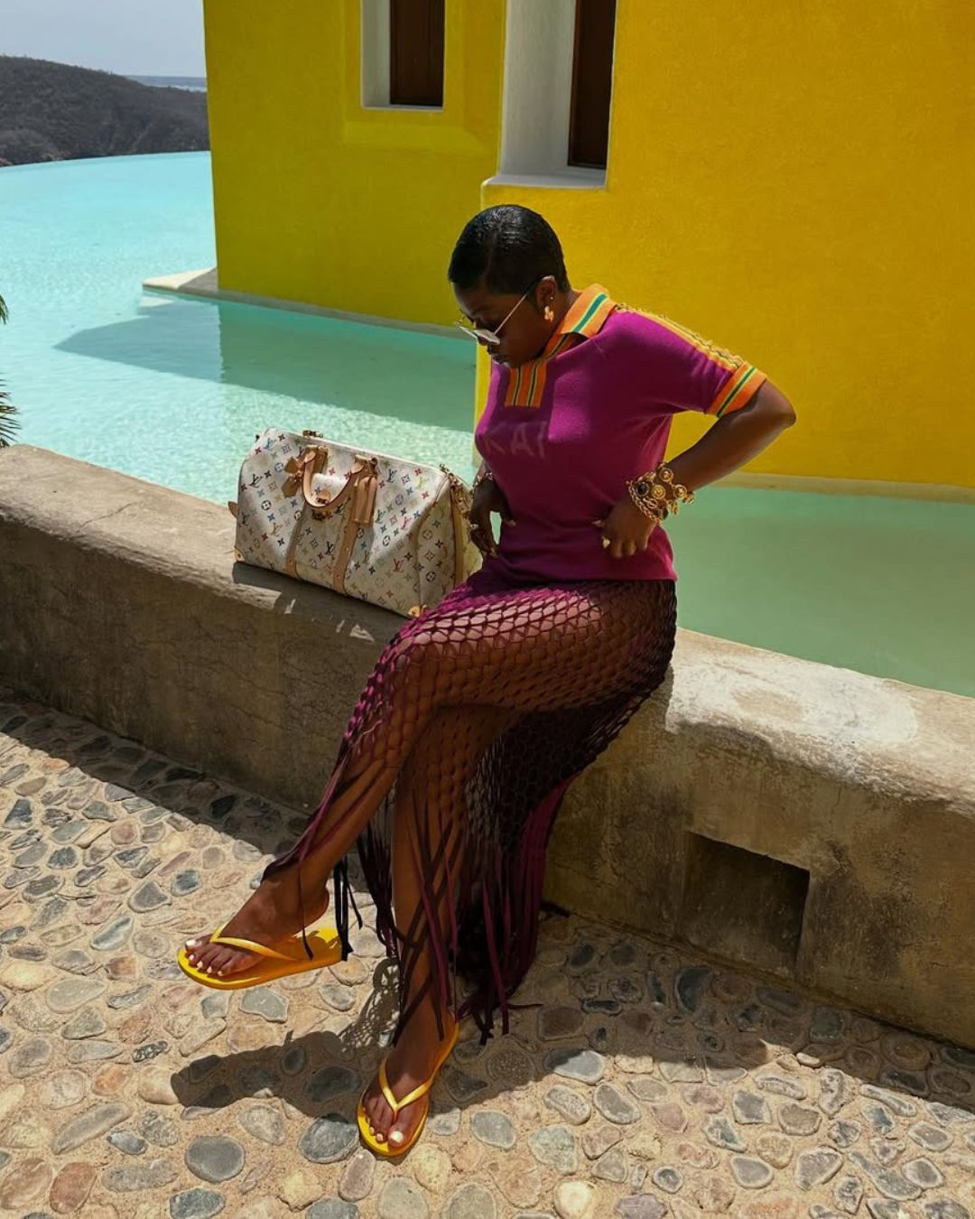 @fisayolonge wears metal frame sunglasses