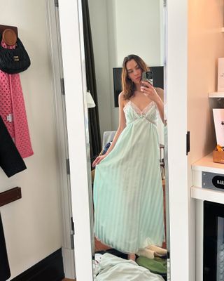 Alexa Chung wears a seafoam green dress.