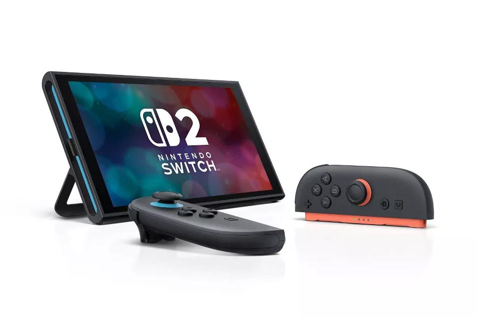 An isolated image of a Switch 2 in tabletop mode with to Joy-Con 2 controllers beside it at an angle.