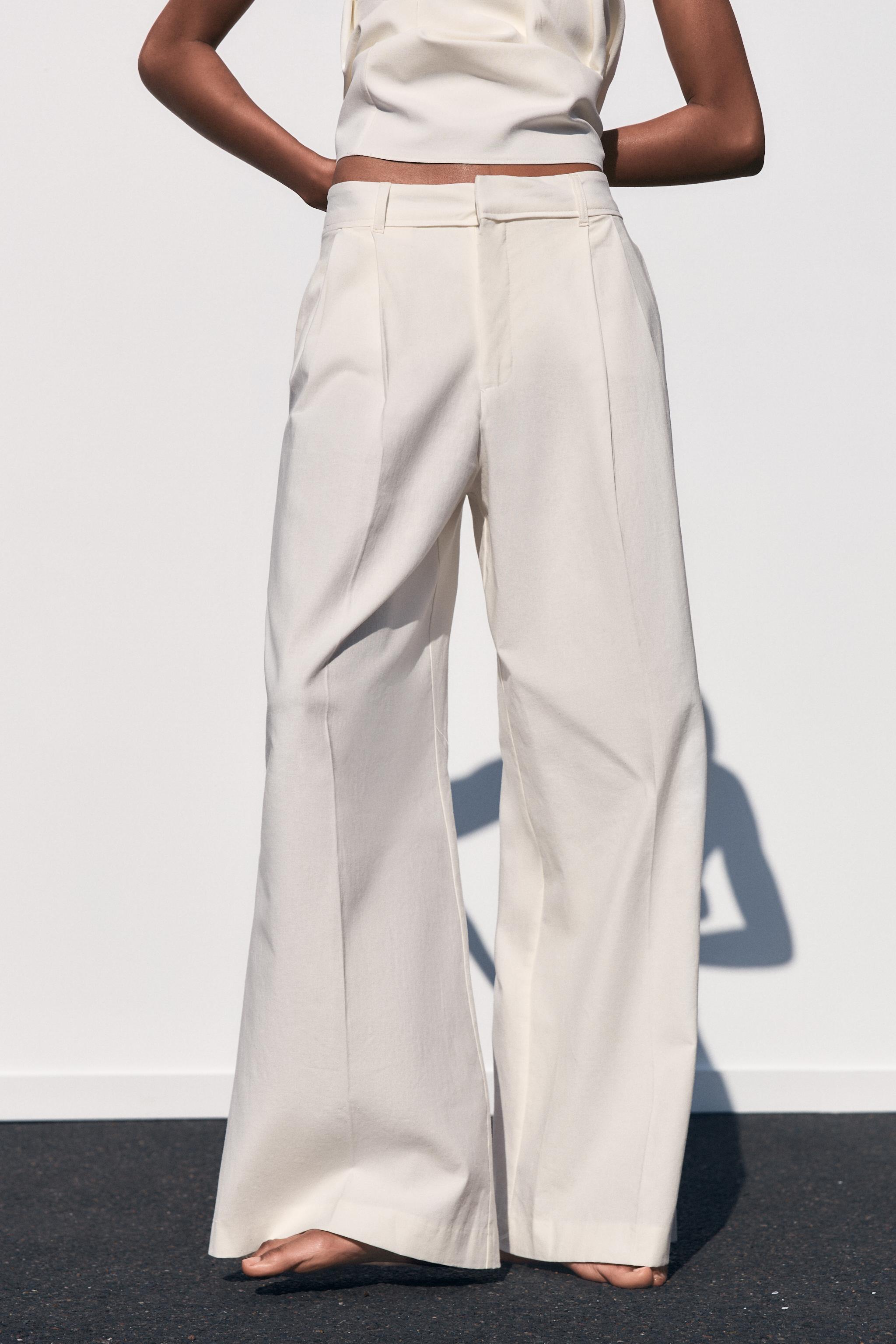 Trousers With Double Pleat