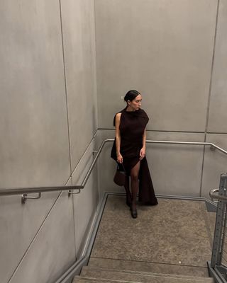 Alexis Badiyi wearing an asymmetrical dress.