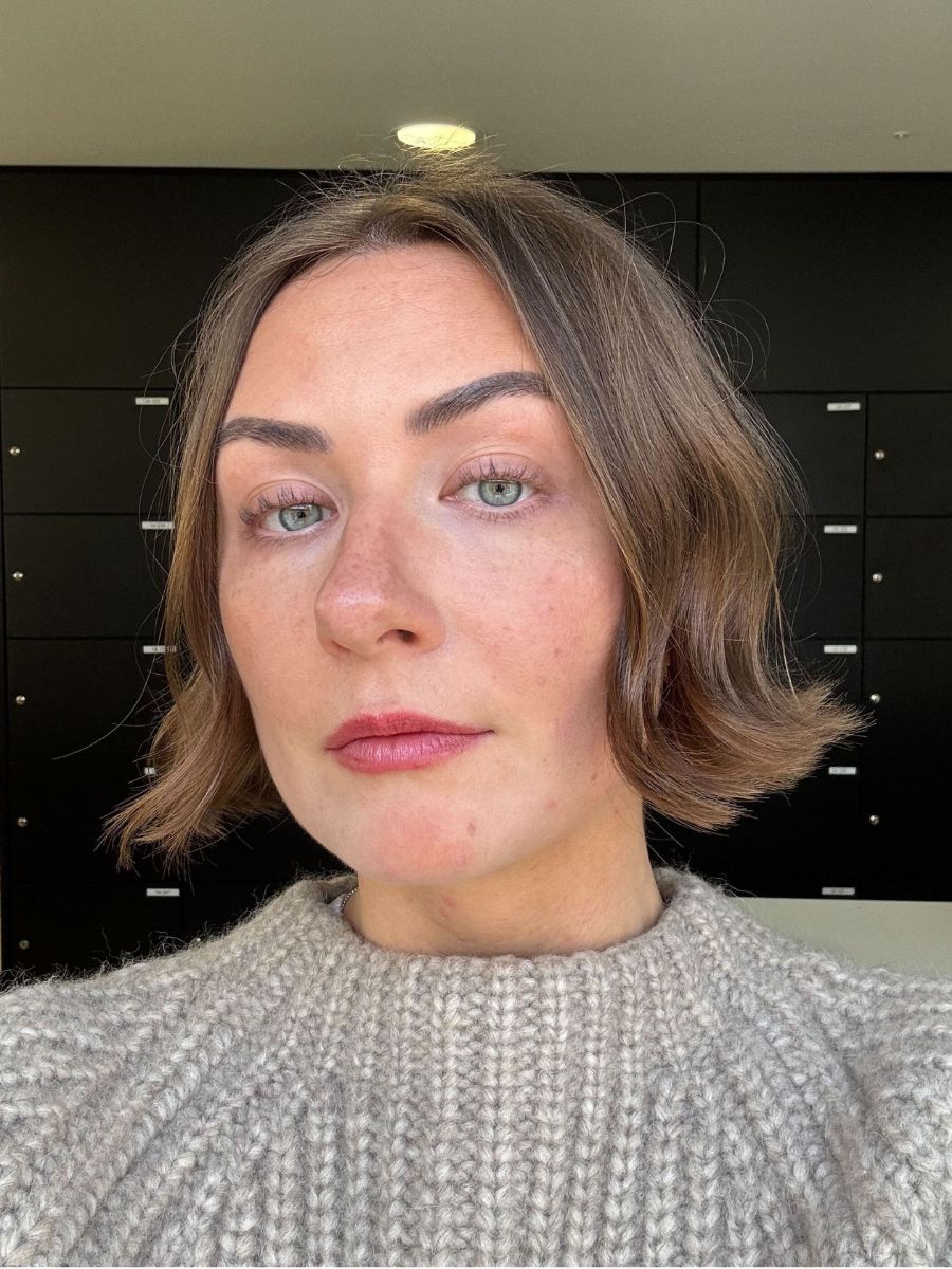 Sophie wearing Hermes silky shine lipstick in Rouge Brillant