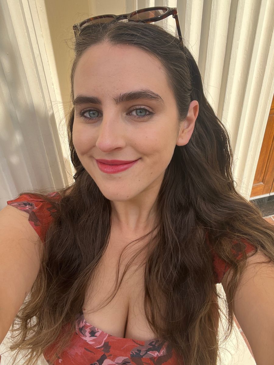 Ava wearing Hermes silky shine in rouge casaque