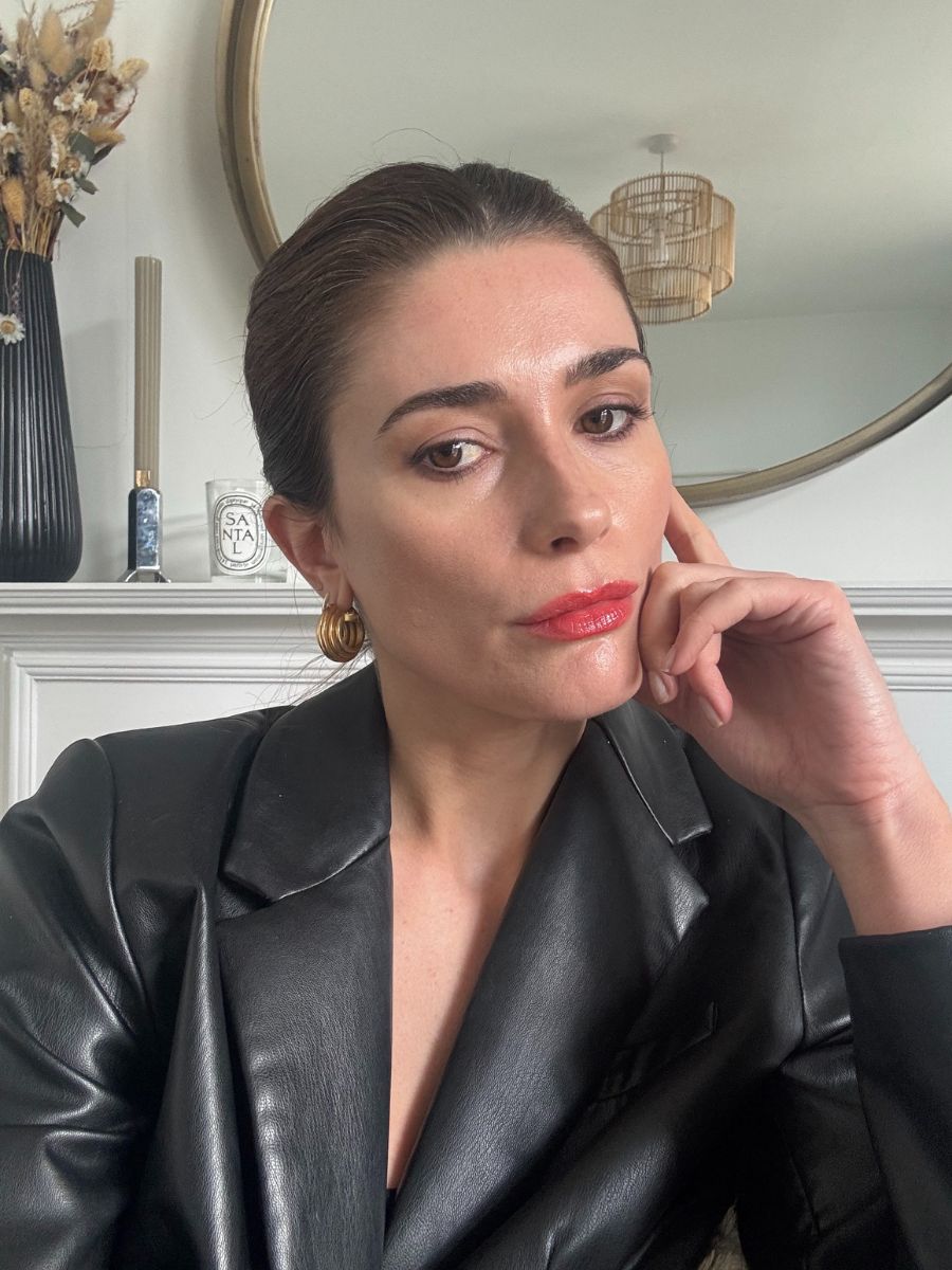 Eleanor wearing Hermes silky shine lipstick in Rouge Amazone