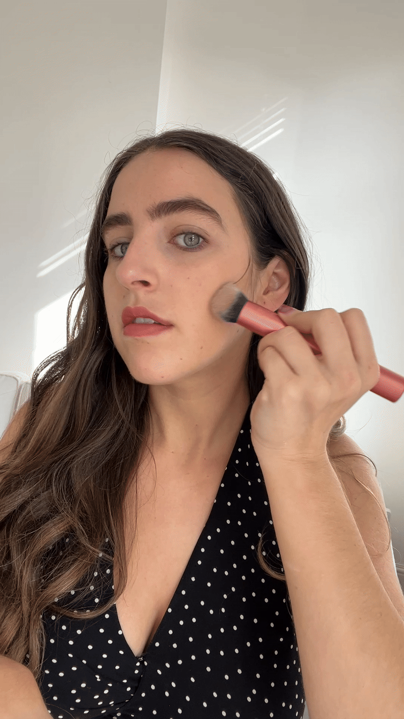 An image of Who What Wear SEO Writer Ava Gilchrist reviewing the Westman Atelier Sun Drops.