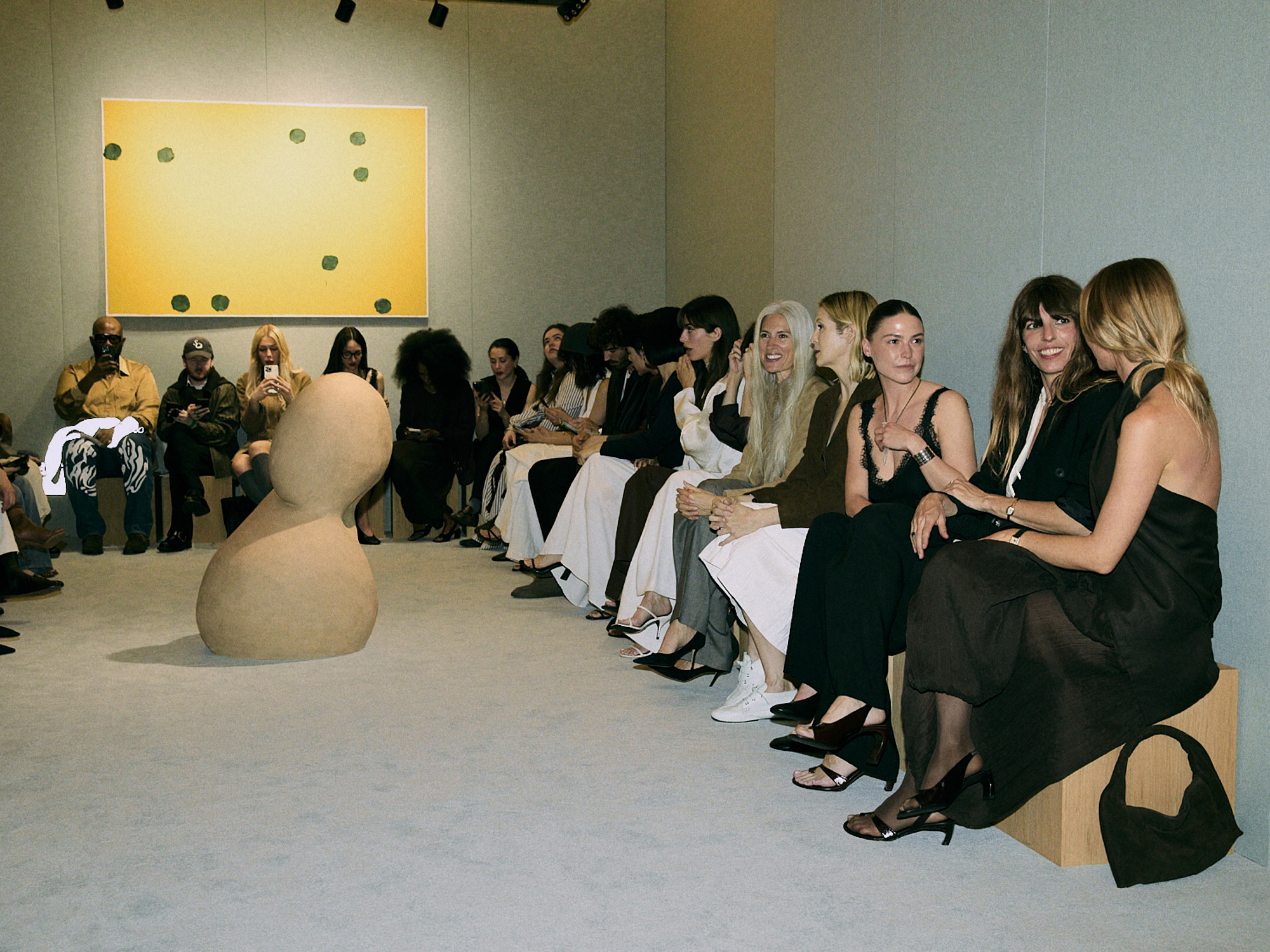 Guests at the Massimo Dutti runway show.