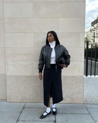 Influencer wears mary janes.