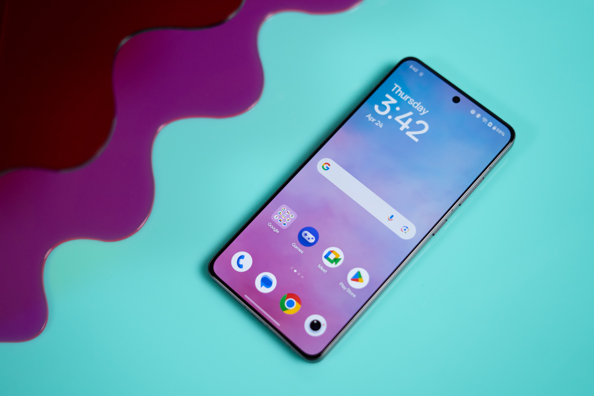 OnePlus 13R on a blue background