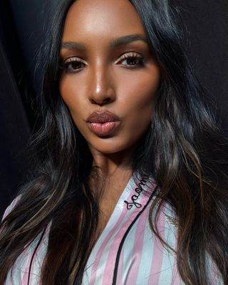 Jasmine Tookes wearing a brown lip.
