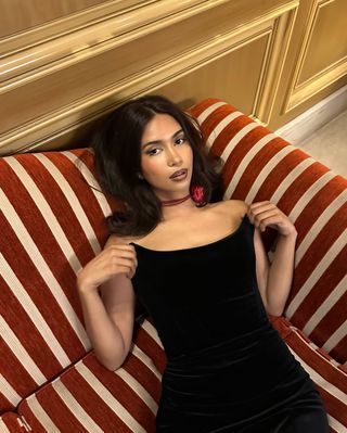 Mishti Rahman wearing a deep brown lip.