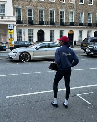 Influencer wears white socks with black shoes.