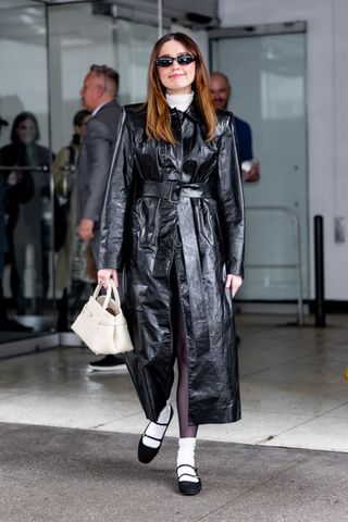 Aimee Lou wears white socks with black shoes.