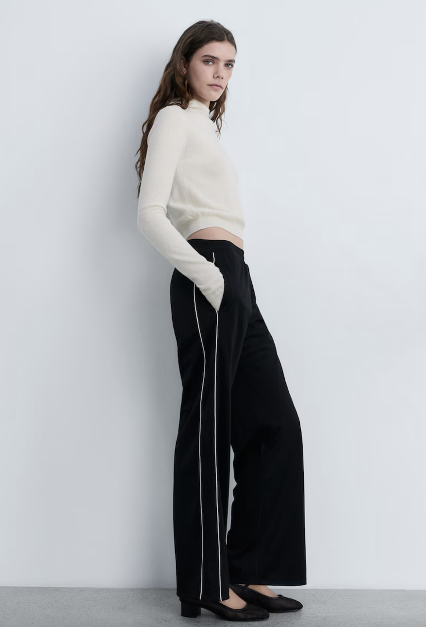 A woman wearing pants. 