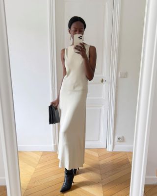 French influencer wearing a long white dress