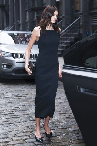 Kaia Gerber wearing a black dress in NYC
