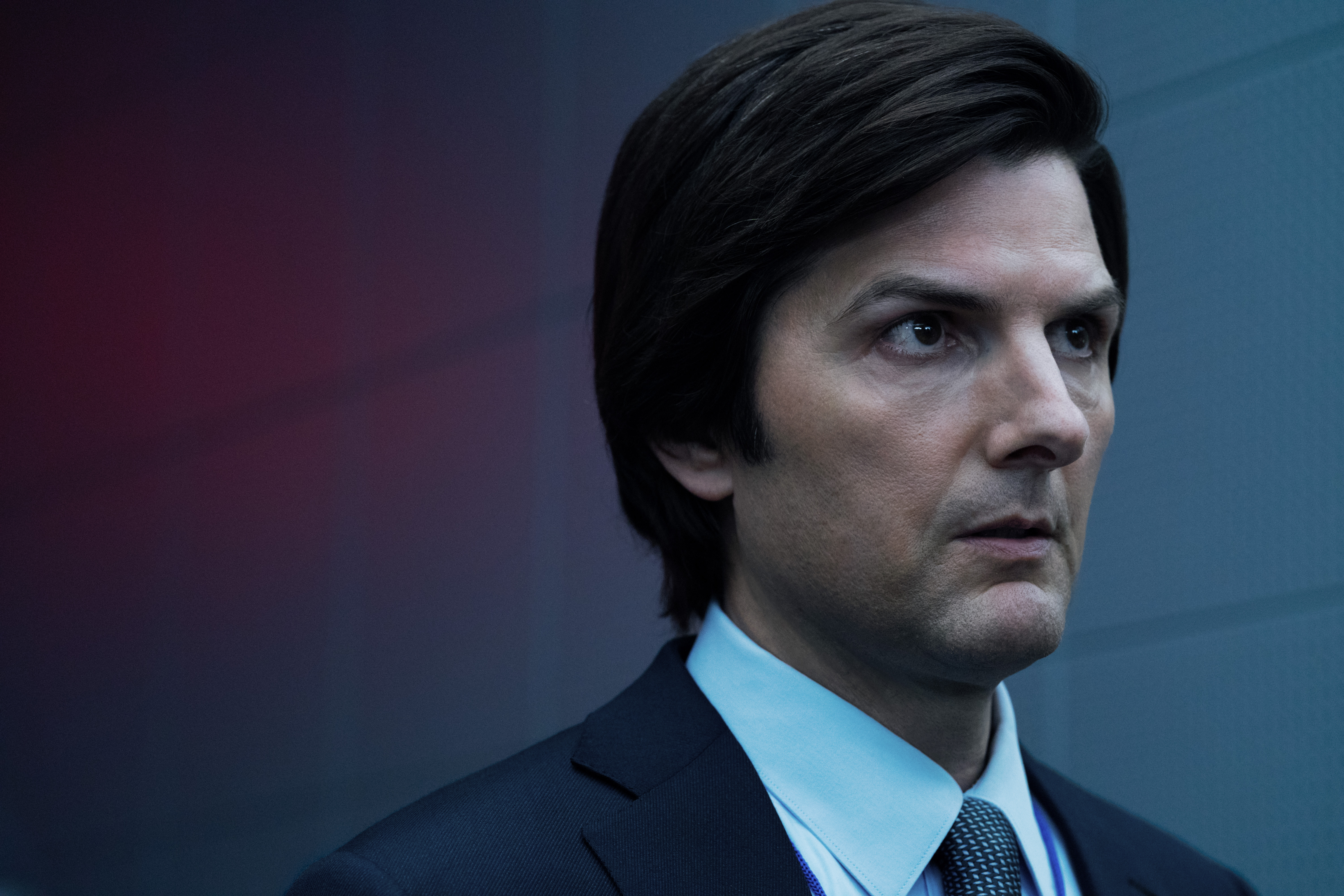 A still photo of Adam Scott in the TV series Severance.