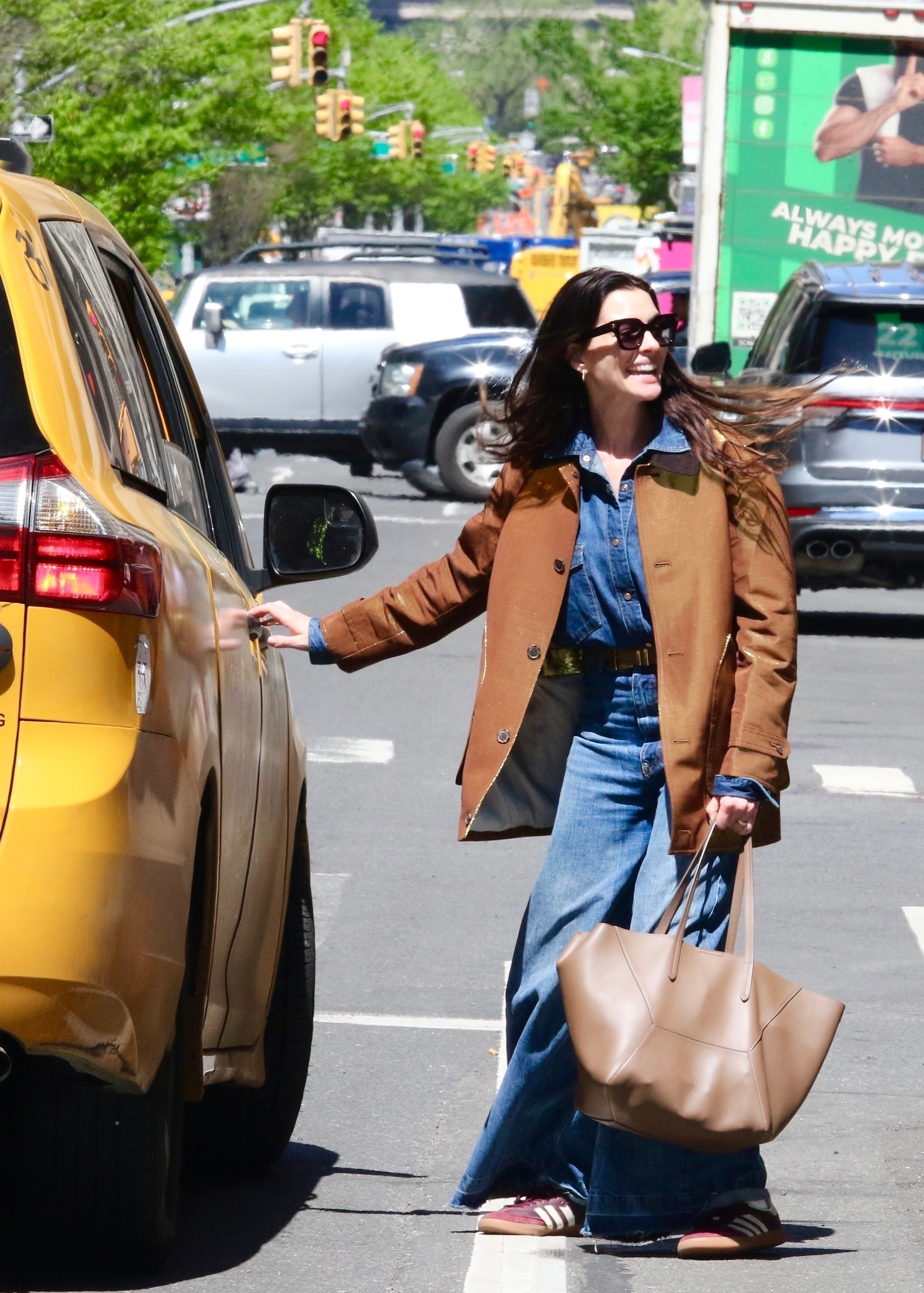 Anne Hathaway wears jeans in New York City.