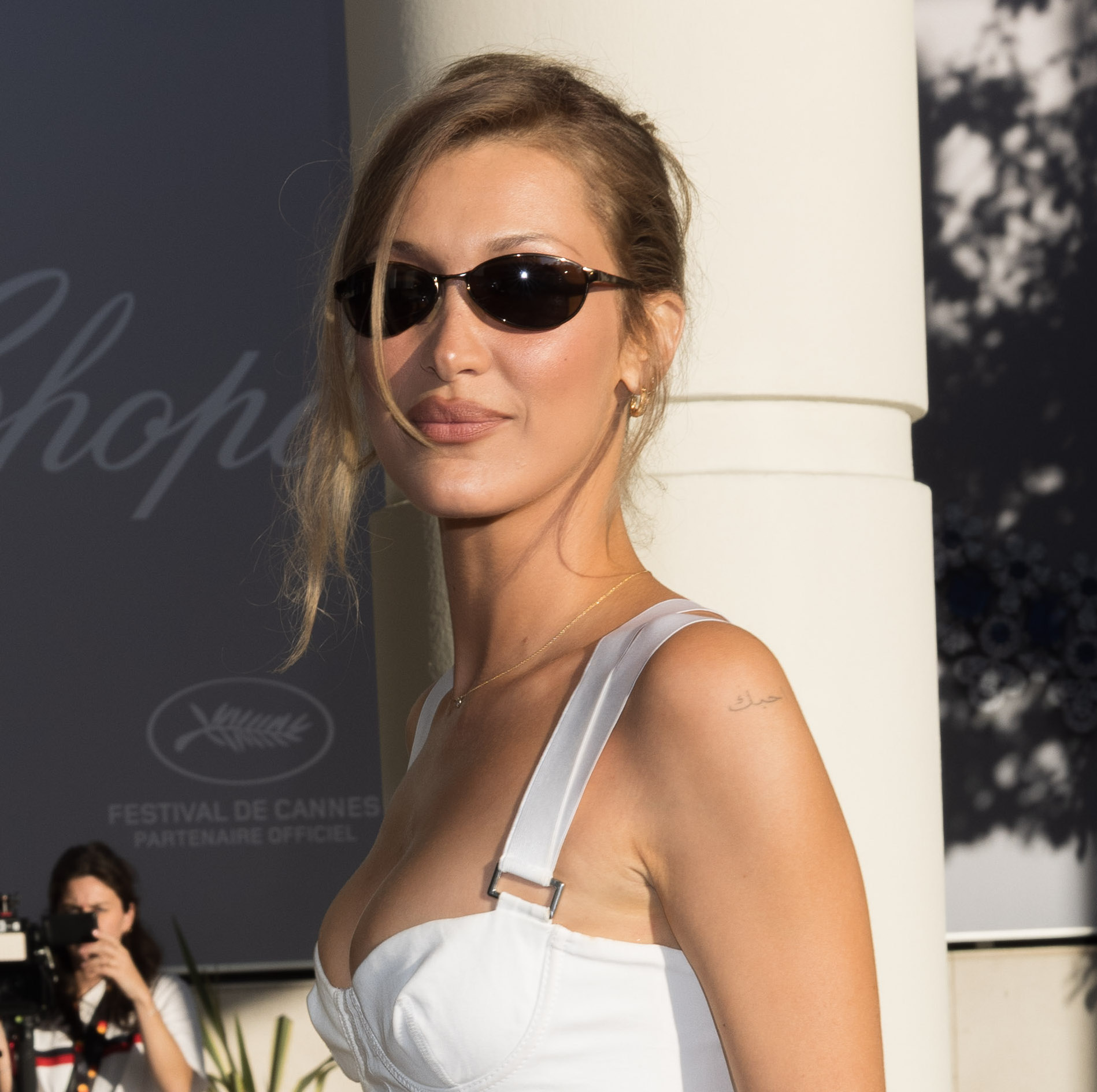 Bella Hadid with honey blonde hair.